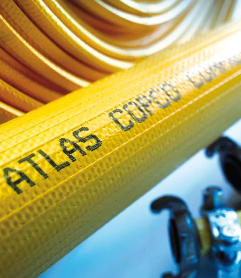 Yellow Atlas Copco air hose