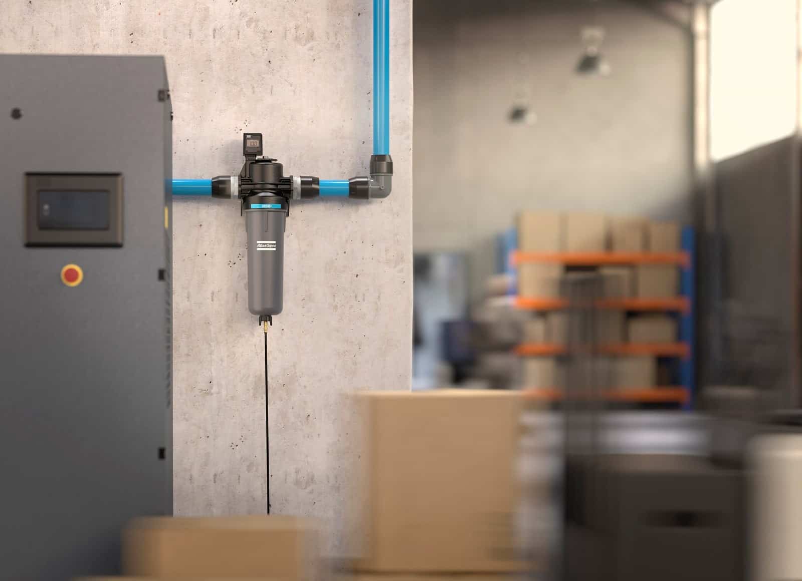 Atlas Copco compressed air line filter on blue pipework