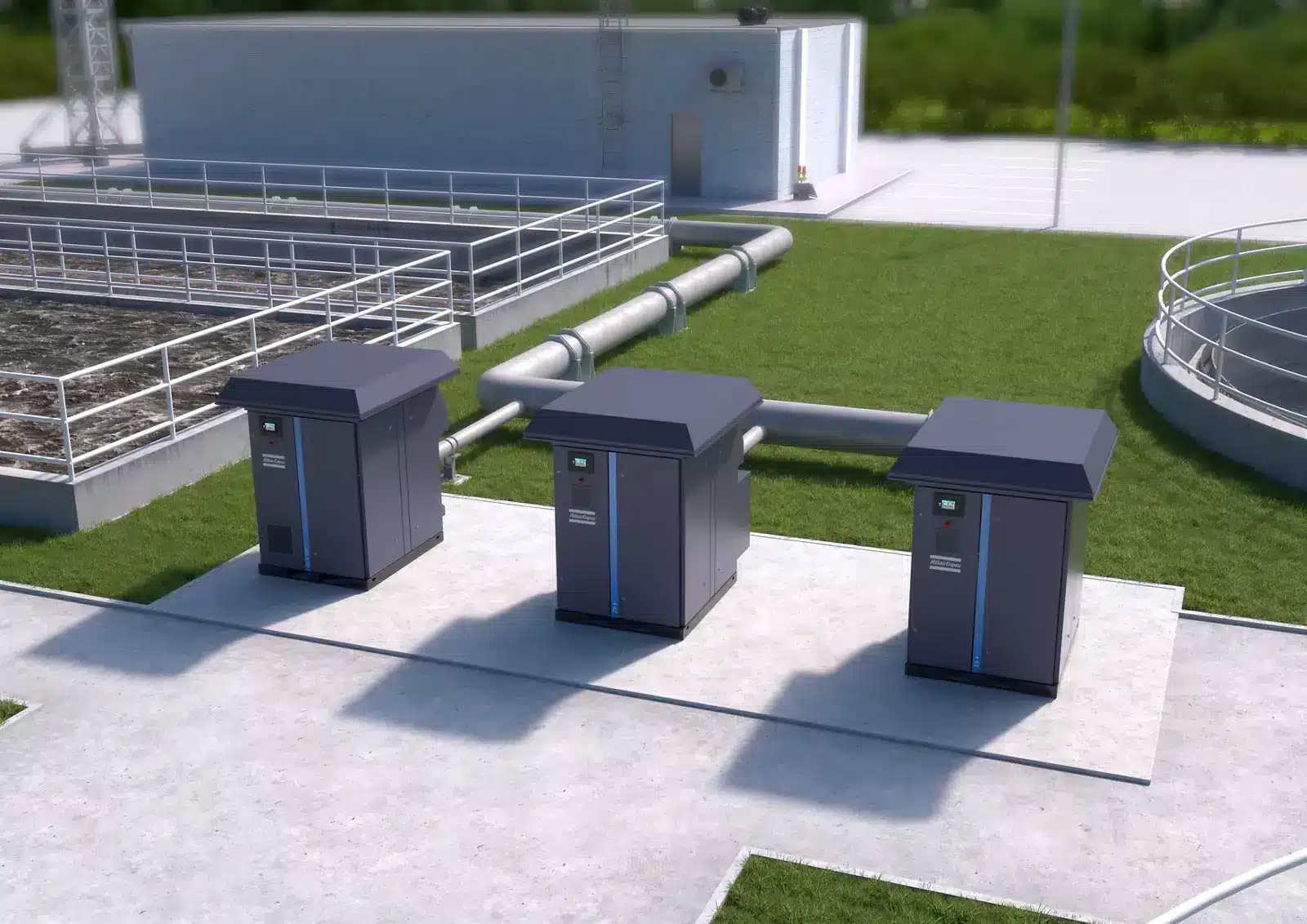 Atlas Copco blower packages beside the aeration lanes of a wastewater treatment works