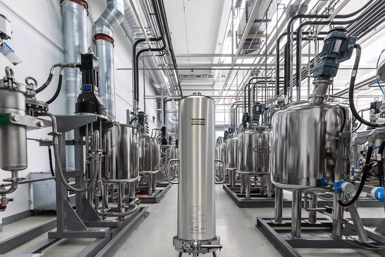 Stainless steel filter housing among pharmaceutical process vessels